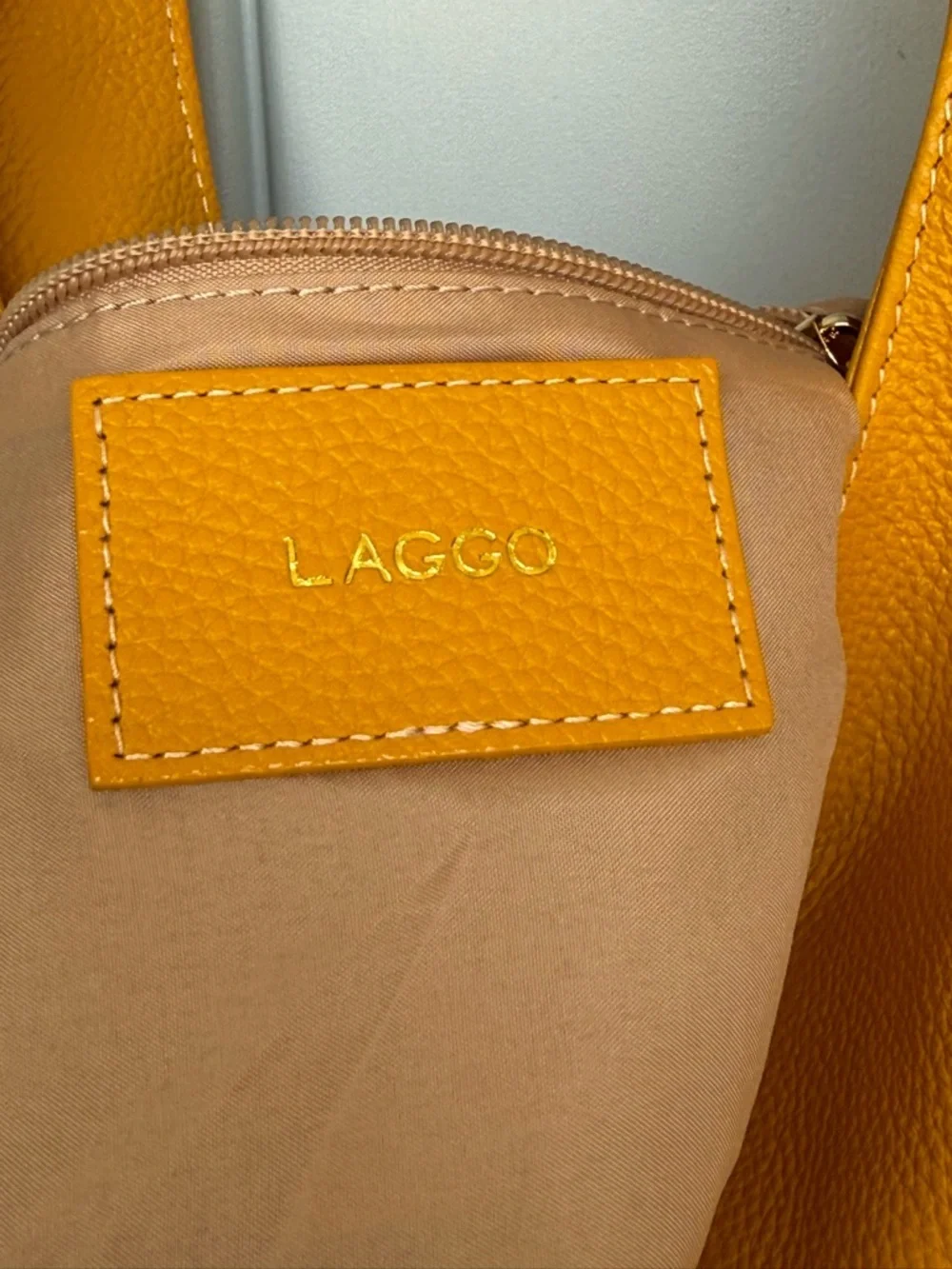 Laggo Havana hobo bag crafted from pebbled genuine leather.